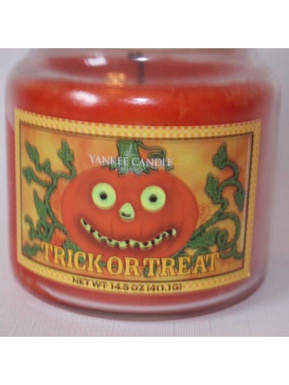 RARE YANKEE CANDLE TRICK OR TREAT CANDLE 14.5 OZ. - Picture 2 of 5